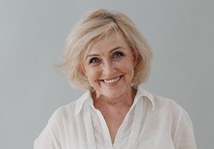 Lady smiling with dentures