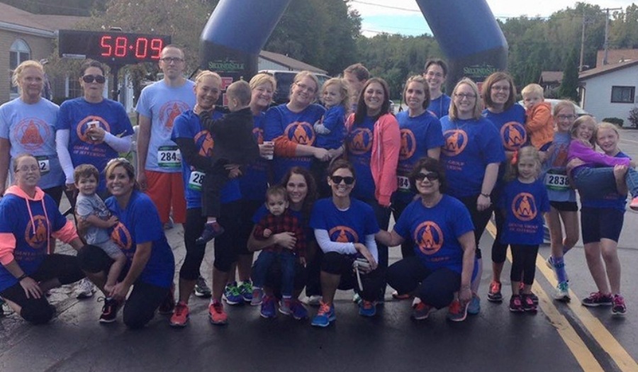 Dental office team members participating in community fun run event