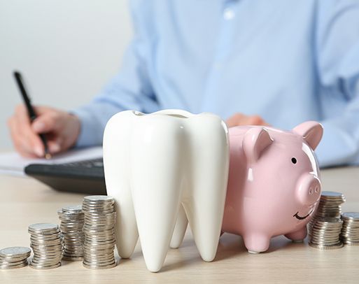 Piggy bank next to coins