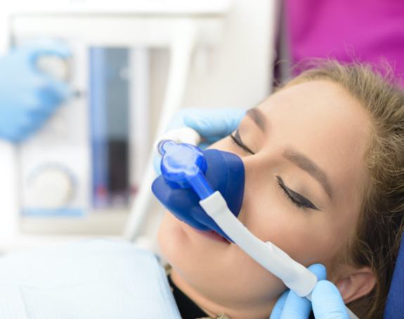 Patient receiving nitrous oxide dental sedation