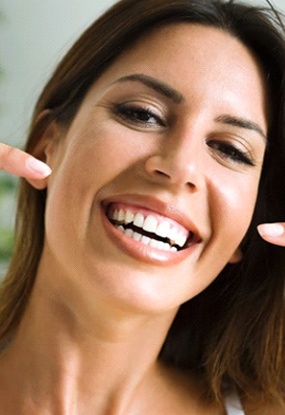 Woman smiling with veneers in Jefferson