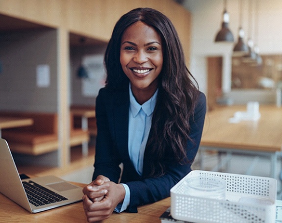 Businesswoman smiling with veneers in Jefferson