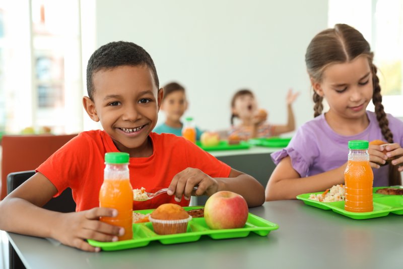 Child eating school lunch