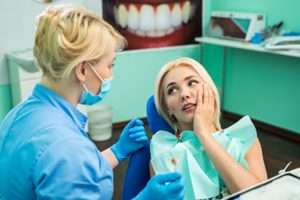 Patient visiting her emergency dentist.