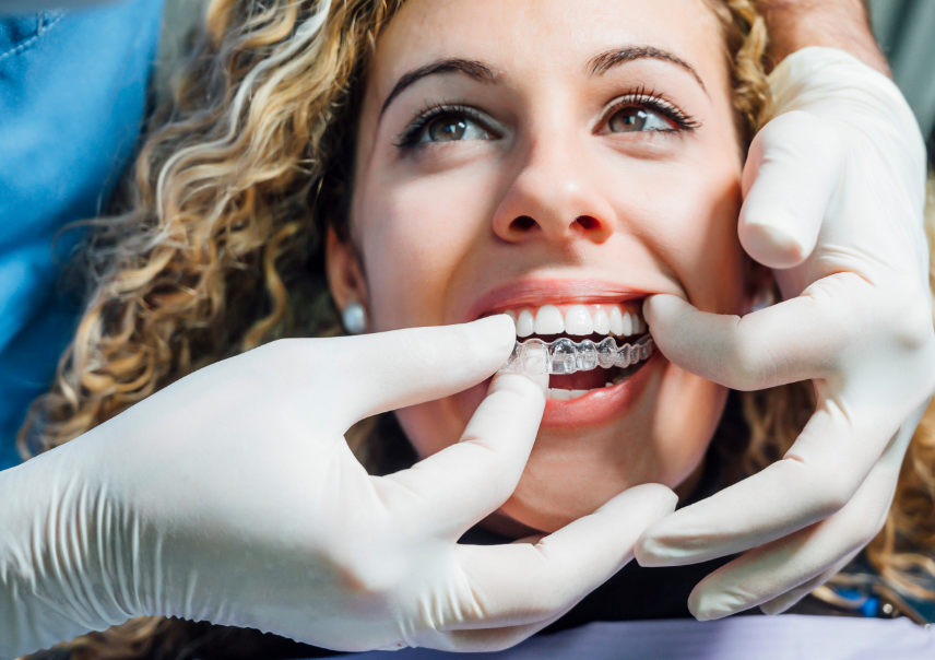 Woman getting Invisalign treatment